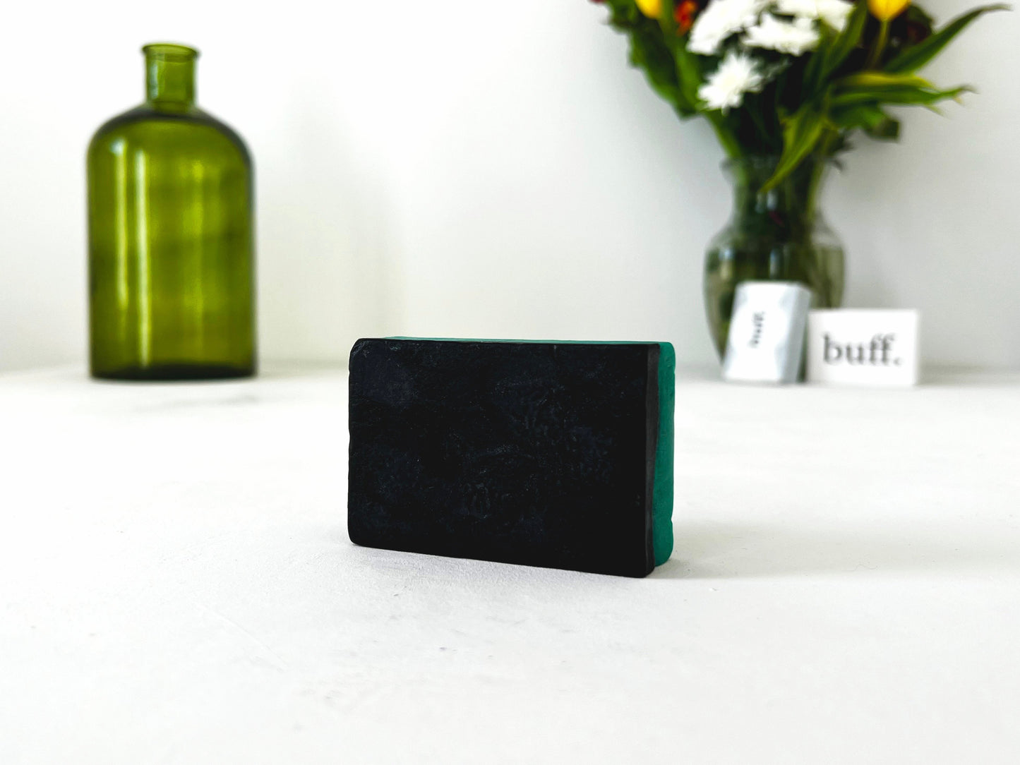 Green and black tea tree essential oil and activated charcoal  handmade and home made vegan soap bar with no palm oil